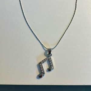 Musical note pendant necklace